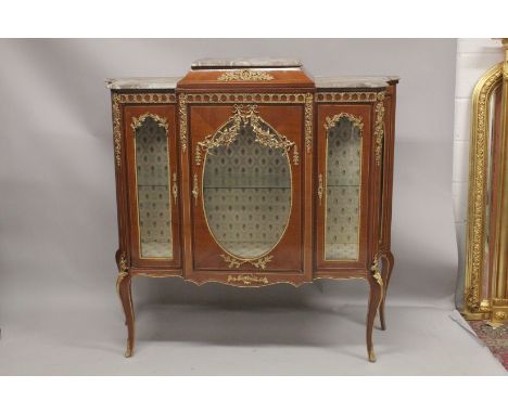 A GOOD, LARGE, LOUIS XVITH STYLE KINGWOOD BREAKFRONT VITRINE with gilt metal mounts, glass shelves and centre oval glass pane