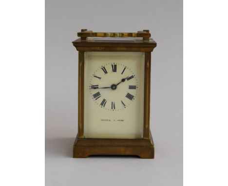 A Mappin and Webb carriage clock with brass surround and Roman numerals,11cmH