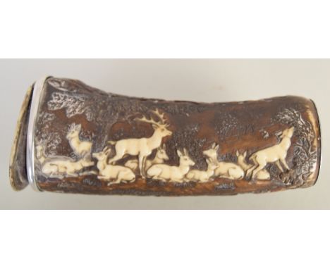 A 19th century carved antler powder flask/small box, carved in low relief with a stag and hinds in a woodland, the hinged cov