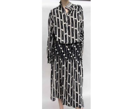 A group of smart 1980s day wear, to include black and white silk print skirt and blouse suit by Zandra Rhodes for Jack Mulque