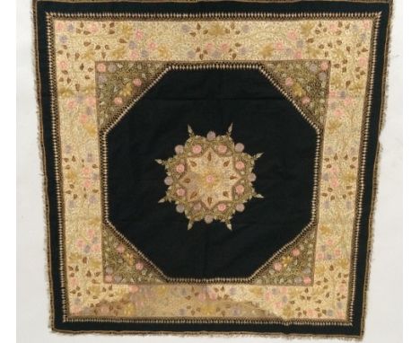 Indian embroidered black wool textile, 124cm square, border and central medallion tightly worked with silk flowers in pink an