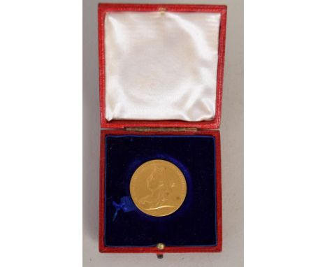 A Victorian Diamond Jubilee gold medal by GW de Saulles, cased, 25mmD, 0.45oz