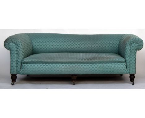 A Victorian frame Chesterfield style sofa upholstered in green fabric, 210 x 77cmH