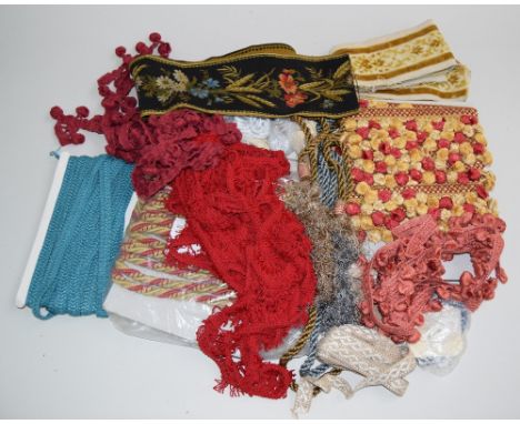 Box of furnishing trims, including Fringe Perle 6 metres in red and gold and 2 metres of rose , with approx 10 metres of 'cor