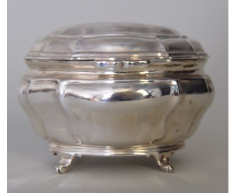 A mid-18th century style Bombay tea caddy with simple paw feet, stamp to base reads 'Goldsmiths and Silversmiths Company', 22