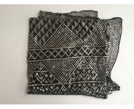 A 1920s black net and silver thread scarf.
