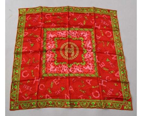 Chanel silk scarf, 88cm square, red, pink and green, barely worn condition with plump rolled edges.