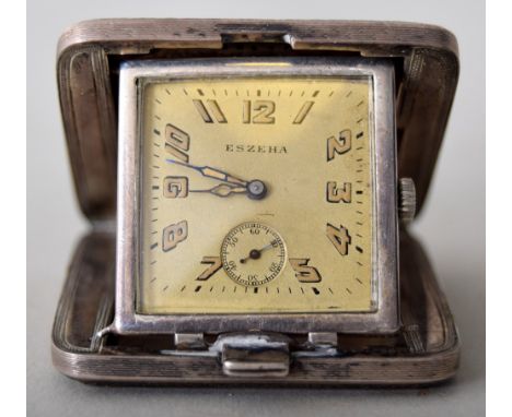 An Eszeha silver cased ladies purse watch, having fine engine turned case, manual wind movement, stamped 935, 4.7 x 4.7cm
