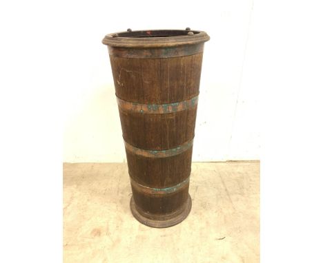 An  early 20th century oak coopered barrel stick or umbrella stand with internal circular metal drip tray. W:30cm x D:30cm x 