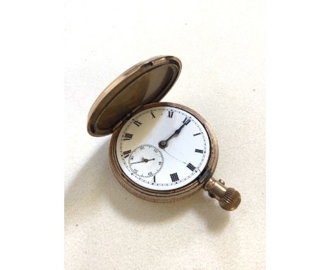 Pocket watch with Rolex Lever movement within an Empress gold coloured case. White enamel dial with Roman Numerals. AF, front