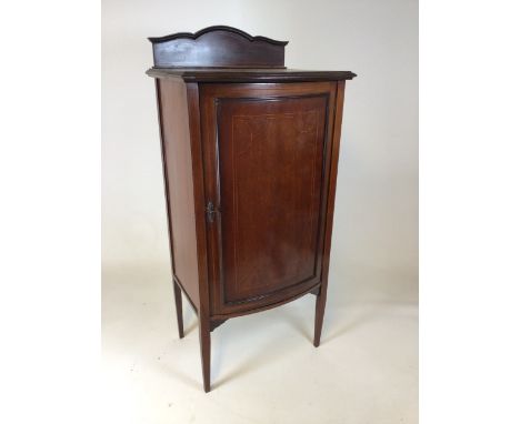 Late 19th century mahogany side cupboard with 4 shelf interior. Boxwood inlay, with working lock, key present. Good antique c