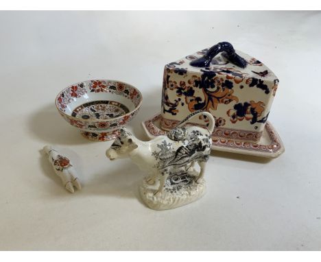 A Staffordshire creamer A/F, a Bolton Trotter, a cheese Keeper and an Ashworth Bros bowl