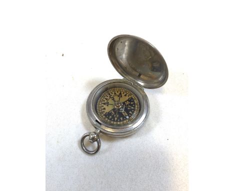 WWI Pocket compass in chromed brass case. 8 cardinal points or winds, bears registered design mark 418645 published in 1903. 