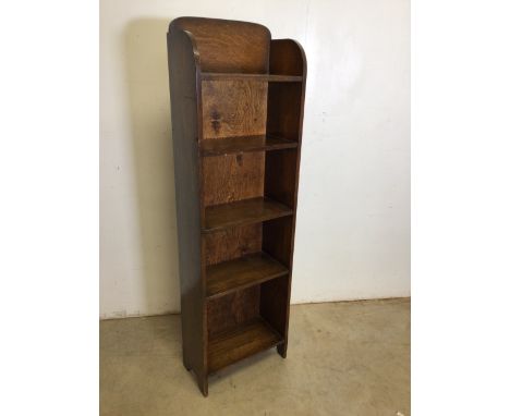 Early 20th century narrow bookshelf cabinet, with 5 shelves in oak. Fine grain interest. Good condition. Shelf width; 34.5cm.