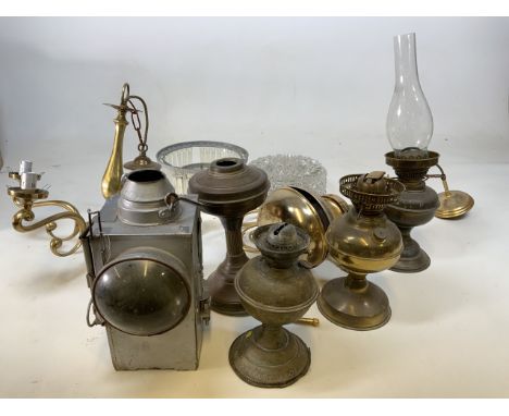A railway lantern also with a quantity of oil lamp parts, a glass ceiling light and others 