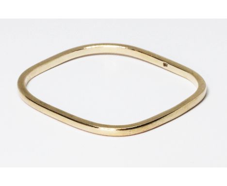 A square section rectangular bangle, marked '9ct', wt. 19.9g, length 65mm.  Condition - good, general wear only.