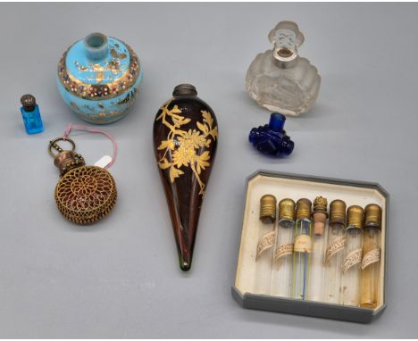 A Selection of antique and vintage perfume bottles; French Amami perfume bottles, Moser blue glass and enamel painted scent b