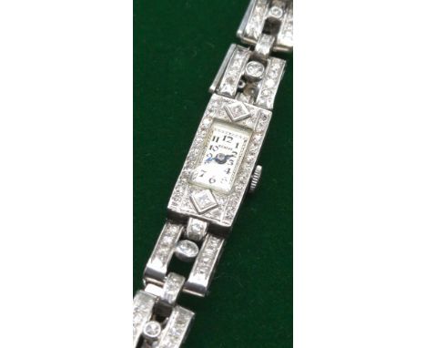 Vintage 1920's Art Deco inspired Platinum and diamond ladies cocktail watch. Approx 1ct diamonds- round cut and varying sizes