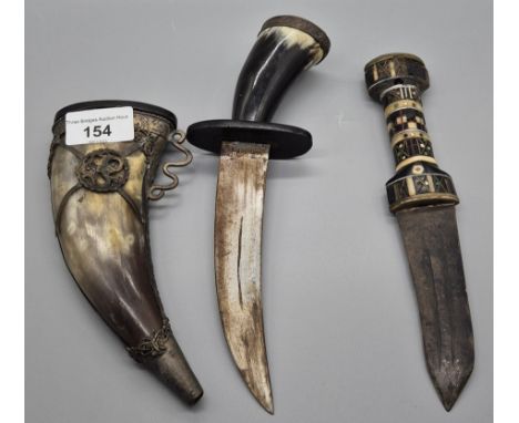 A collection of two eastern knives; vintage Brass Mounted Jambiya Knife together with Horn handled dagger in fitted sheath [2