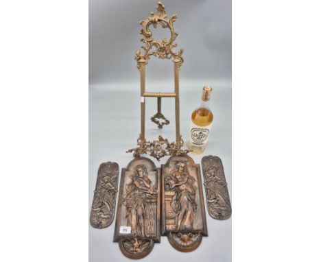 Various collectables; Pair of cast iron/ metal figure plaques, Two cast iron reproduction door facer plaques and Ornate brass