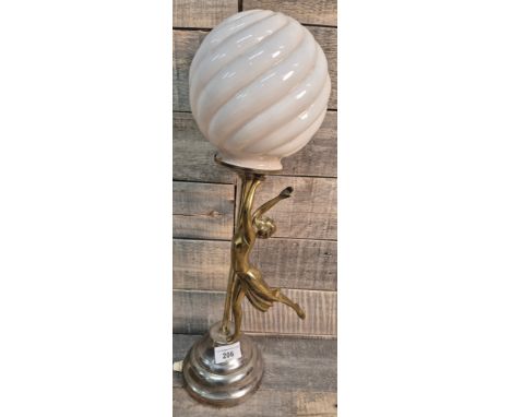 Art Deco inspired brass and chrome figural lady lamp. Comes with pink tone globe shade. [47.5cm high] 