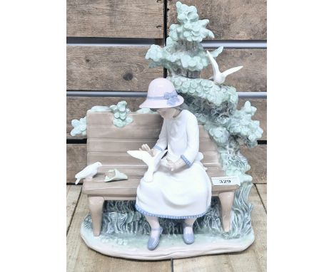 Large Nao figure; Girl feeding doves on the bench. [545][33cm high]