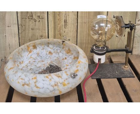 Antique magnifying lamp converted into a table lamp. Together with an art deco U.F.O. Shaped shade. 