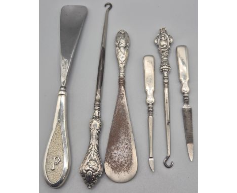 A Selection of silver hallmarked handled manicure and utensil items; London silver and shagreen handle shoe horn, Birmingham 