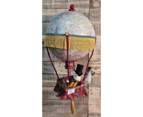 Mixed media sculpture; two mice in a hot air balloon. [45cm length] 