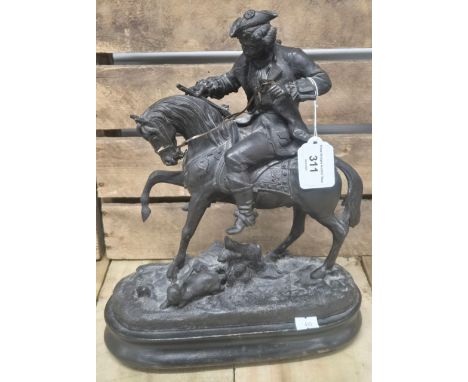 19th century Bronzed Spelter figure sculpture- Well dressed gentleman figure on horseback hunting a rabbit. Raised on a woode