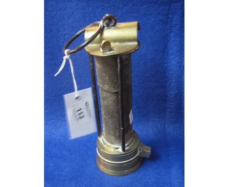 Vintage miners davy lamp marked Davis Darby number eighteen.