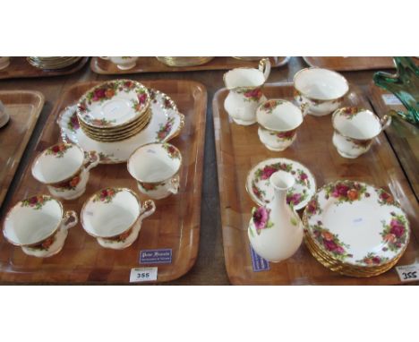 Two trays of Royal Albert bone china old country roses tea ware items comprising teacups and saucers, milk jugs, sucrier, pla