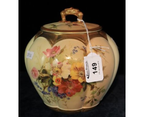 Royal Worcester porcelain fluted jar and cover hand painted with floral sprays on a blush ivory ground within gilt borders. P