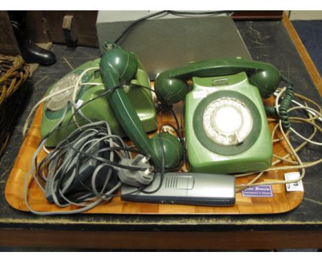 Two similar green Bakelite style vintage telephones together with modern BT freestyle telephone and stands.  (3)