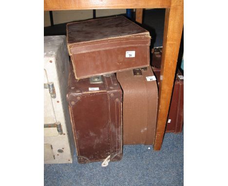 Four assorted vintage leather and other suitcases of different sizes.  (4)