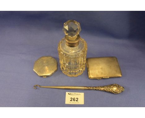 Small quantity of silver items to include: octagonal compact; cigarette case; button hook and glass; silver collared scent bo