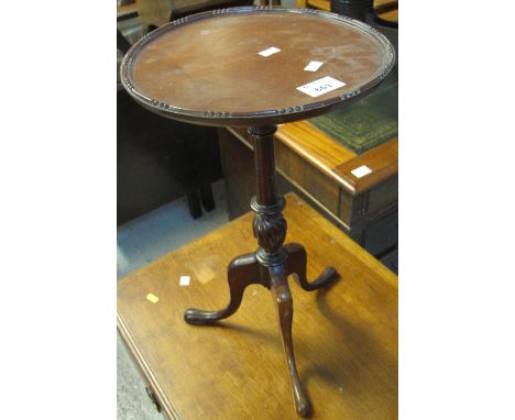 Reproduction mahogany tripod wine table.