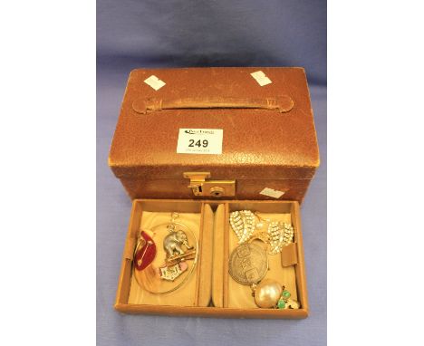 Vintage jewellery box with one fitted pull out tray containing bangle, elephant pendant, costume jewellery, 1964 Championship