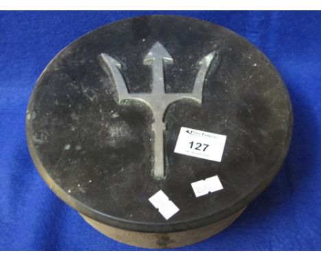 Pair of circular wooden plinths, possibly barrel tops with white metal trident decoration. (2)