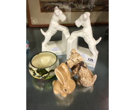 A pair of Goebel china bookends modelled as Terriers together with two Sylvac figures and a Crown Dorset sugar bowl decorated