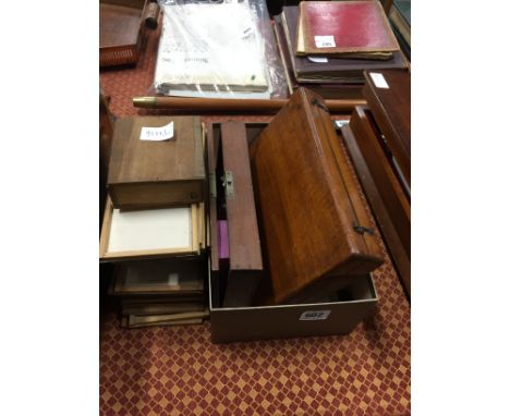 Various microscope glass slides and related items.