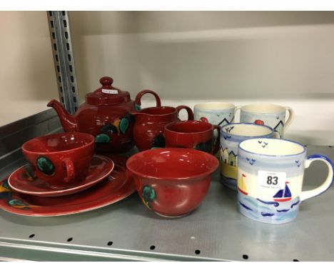 A Poole Pottery Living Glaze breakfast set for one decorated in the Odyssey pattern together with four beach hut and boats Po