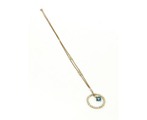 A seed pearl and blue stone 9 carat gold necklace.
(R3)