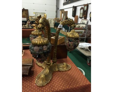 A three branch glass grape shade table lamp.