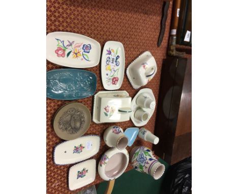 A collection of various white bodied and other Poole Pottery items.