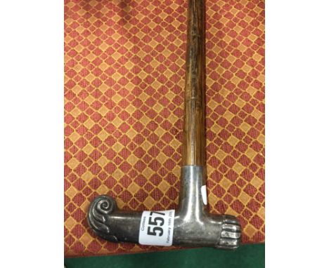 A silver handled walking stick.
(R35)