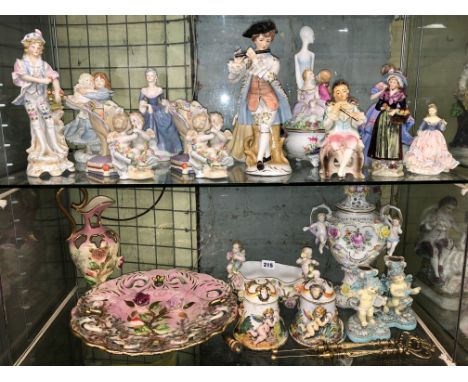 TWO SHELVES OF CAPO DI MONTE BELLS, VASE AND COVER, TROUGH PLANTER