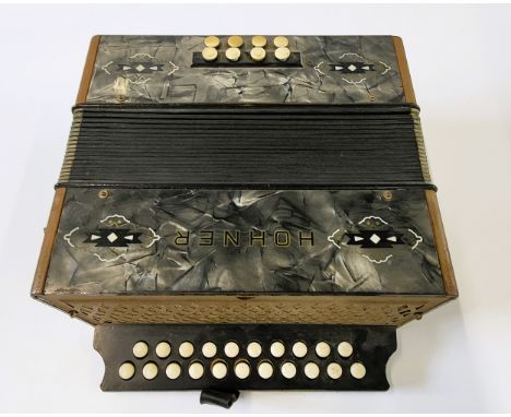 An Hohner Liliput accordion.