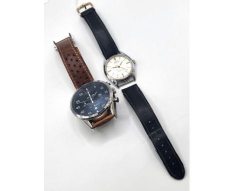 A 1960's Oris, waterproof, anti-shock, 15 jewel watch on a leather strap, also to include a gents fashion watch on a perforat