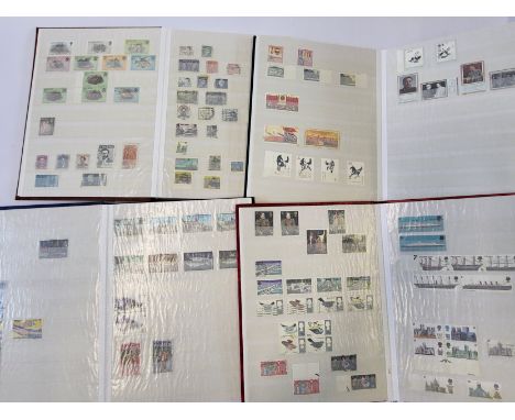 Four stamp albums in excellent condition:Album 1: Stamps and 1st day cover from UK, Ireland, Jersey and Guernsey.Album 2: Sta